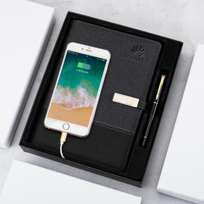 China 10000mAh hardcover book donations idea with screen indicator cable charging multifunctional powerbank leather notebook for sale