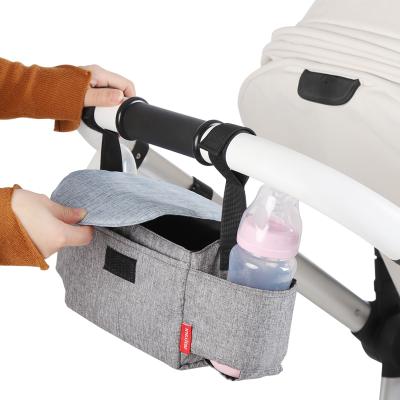 China Multifunctional Purpose Hanging Universal Baby Stroller Organizer Bag with Cup Holders for sale