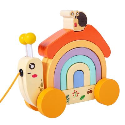 China DIY TOY Wooden snail drag car baby rainbow house pull rope suction toddler toy car boy girl puzzle blocks for sale