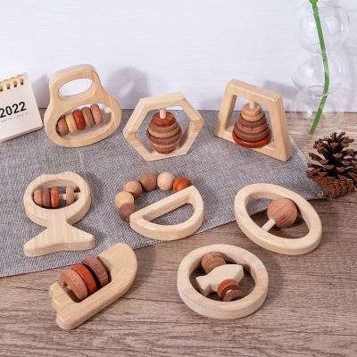 China Musical Toy Kids Gift 100% Natural Wooden Baby Toy Handle Rattle Teether Teether Bell Animal Bell for sale