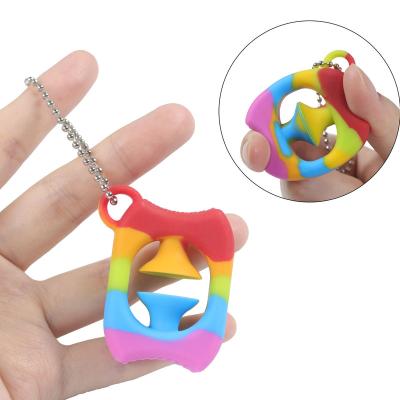 China 2021 New Arrival Mini Popper Noise Maker Grab Hand Grip Snap Break Key Chain Rainbow Key Chain Sensory Toys for sale