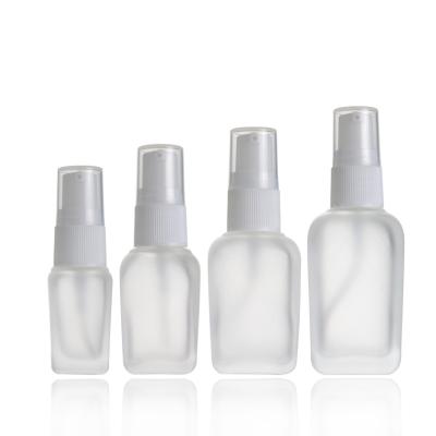 China Personal Care Frosted Oil Dropper Clear Square Glass Bottles 30ml, 20ml, 10ml With Gold Alumite Dropper Lid for sale