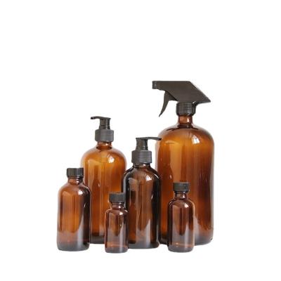 China Factory Wholesale Cosmetic Round Trigger Spray Glass Bottles Amber Boston Bottle 8oz 16oz for sale