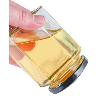 China Food Packaging Hexagon Storage Container Wide Mouth Glass Jars For Jelly Jam Honey With Lid for sale