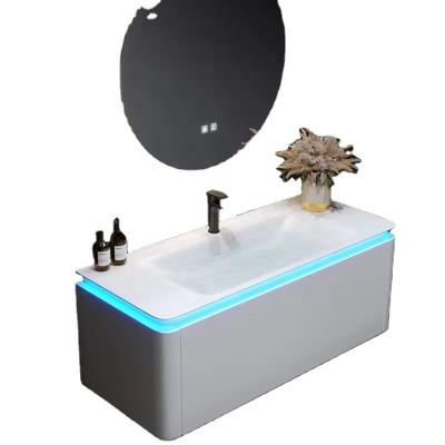 China Modern Waterproof High Density Pvc Bathroom Cabinet With Round Led Mirror for sale