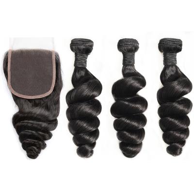 China Loose Wave Raw Virgin Indian Hair Bundle With Closure for sale