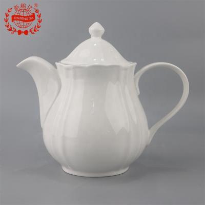 China Modern Design Viable Wholesale Handle Teapot Petal Shape Ceramic Teapot With Cup for sale