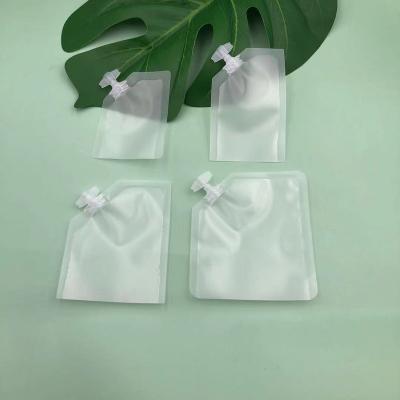 China Safety Sample Spout Bag Translucency Cream Essential Oil Skin Lotion Packaging Spout Plastic Liquid Pouch For Cosmetic Makeup for sale