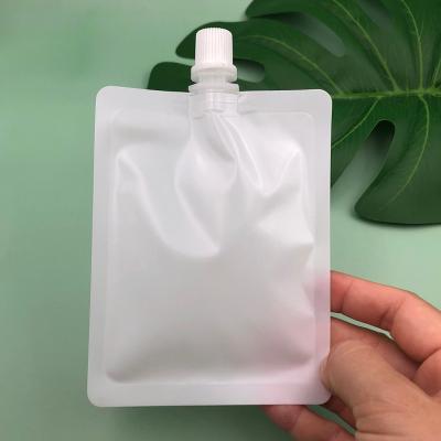 China Hot Selling White Matte Plastic Spout Pouch Cream Lotion Packaging Bag Tamper Proof For Cosmetic Makeup for sale