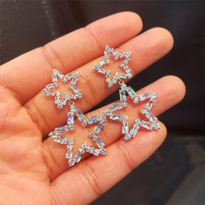 China Fashion TRENDY Classic Korean Style Shining Hollow Out Pentagram Double Star Costume Party Ladies Earrings for sale