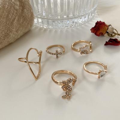 China FASHIONABLE European and American Butterfly Ring Rhinestone Crystal Ring 5pcs/set Style Triangle Heart Cross Set for sale