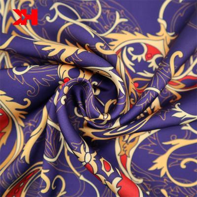 China Anti Pill Vintage Kahn Print Polyester Silk Satin Fabrics For Clothes for sale