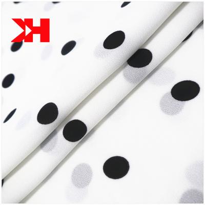 China Kahn fashion style 100% polyester fabric blakc polka dot Shrink-resistant polka dot printed polyester silk chiffon fabric for sale