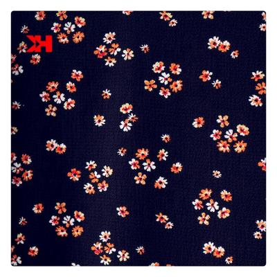 China Floral Print Bubble Chiffon Designer Fabric 100% Polyester Viable Black Textiles Material 120gsm For Dress Shirt for sale