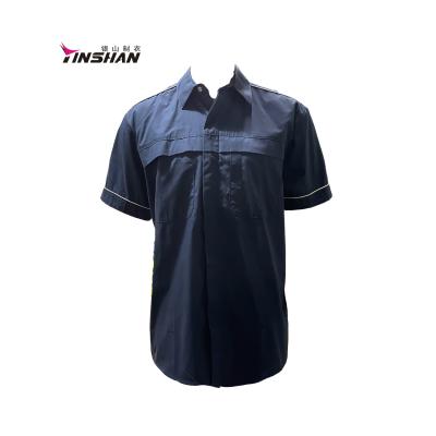 China Unisex de verano para adultos ropa de trabajo de algodón azul con logotipo personalizado con manga corta en venta