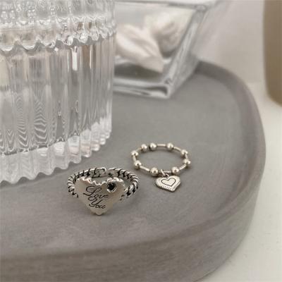 China Hot Korean Fashion PS Fashion Heart Shape Rings S925 Sterling Silver Made Carved Love Hugging Open Rings for sale