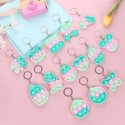 China Promotion Toys Fast Delivery Multi Design Funny Wiggle Toy 5 Cm Gift Plastic Girls Wiggle Toy Keychain for sale