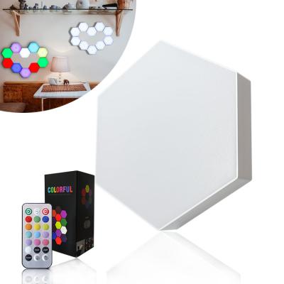 China New Modern Warm Creative RGB Lamp Hexagon Lights Touch Hexagon Light Panels Hexagonal Modular Lights for sale