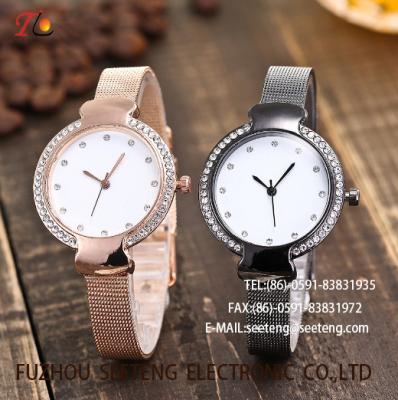 China LADY WATCH WITH  DIAMOND ALLOY WATCH QUARTZ WATCH  AND METAL WATCH BAND FASHION WATCH  CONCISE  STYLE BLACK/GOLD for sale