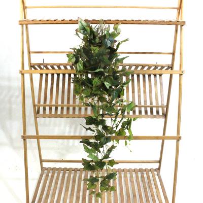 China Home Decor 120cm Eco-friendly Realistic Foliage Wall Hanging Leaves Artificial Plants Indoor Ornamental Plants On Sale for sale