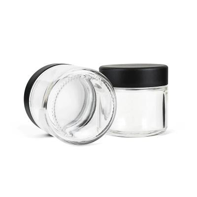 China 1oz 2oz 3oz 4oz Child Resistant Packing Glass Jars Packaging With Child Proof Plastic Lid for sale