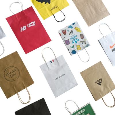 China Customized white high quality cheap shopping paper bag biodegradable logo paper bag kraft paper bag clothing shopping paper bag for sale