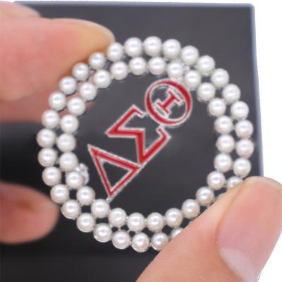 China ALLOY Sorority Women Logo Hollow Out Round Alloy Dot Pearl Apparel Brooch Pin for sale