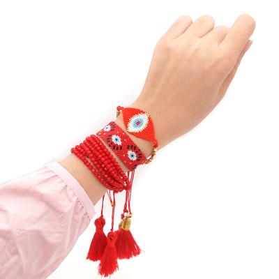 China Handmade Fashion TRENDY Miyuki Eyes Love Cross Wristband Jewelry Bracelet Mixed Color Pull Rope Bracelet for sale