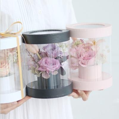 China Recycled Materials Many Color Plastic PVC Cylinder Box Round Shape With Ribbon For Foldable Flower Packaging for sale