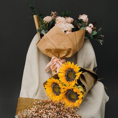 China English Flower Sunflower Wrapping Paper Bouquet Biodegradable Paper Gift Wrapping English Newspaper Materials 20pcs Per Bag for sale