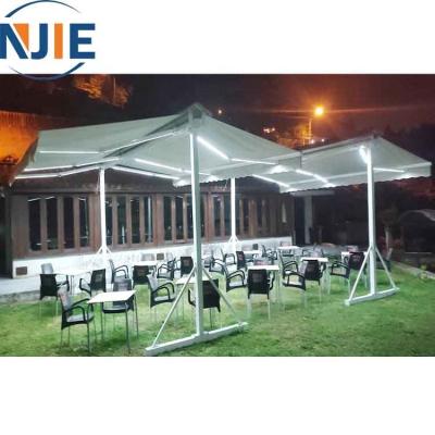 China Aluminum Motorized Free Standing Double Slope Garden Retractable Sunshade Waterproof Sunshade Goods Windproof Pop Up Tent for sale