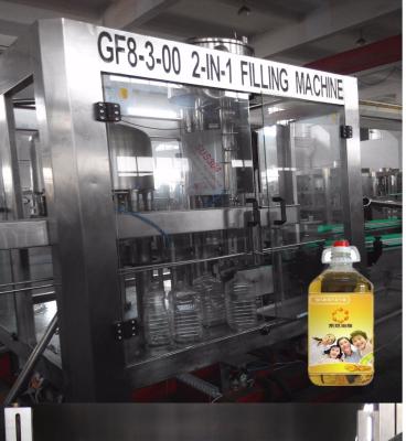 China Small Bottle Edible Oil Packaging Machine , 500ml-1L Oil Bottle Filling Machine for sale