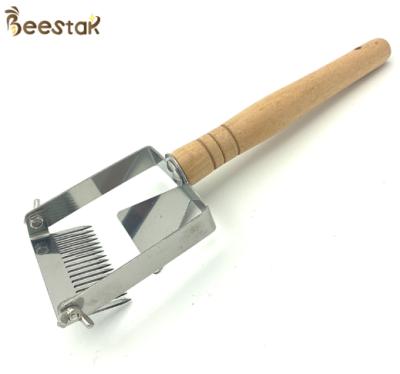 China Small Adjustable Screw Wooden Handle Uncapping Fork Beekeeping Brush With Adjustable Screw for sale