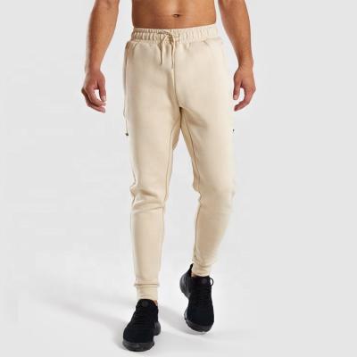 China Anti Static Joggers Sports Pants Custom Long Drawstring Mens Track Pants for sale