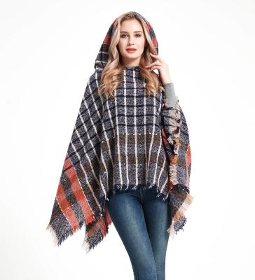 China Soft 2023 winters hooded towel knit soft Mexican polyester poncho winter scarf poncho women for sale