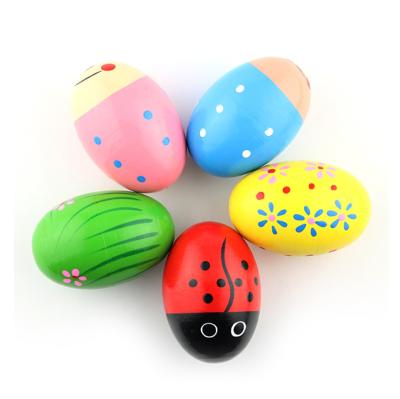 China Hot Selling Pattern Cute Color Sand Baby Toys Wooden Percussion Instruments Sand Eggs for sale