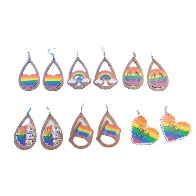 China New FASHIONABLE Europe and America rainbow water drop hollow wooden earrings color printed letters flower heart peace wooden earrings for sale