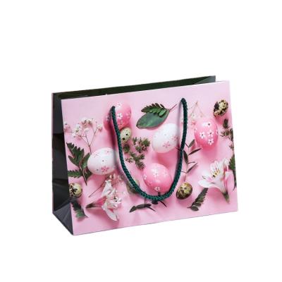 China Wholesale high quality recyclable custom logo printed gift paper bag biodegradable shopping paper bag for sale