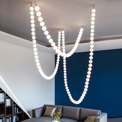 China Project Customized Nordic Modern Nordic Hanging Beads Luxury Hotel White Milky Pendant Light Chandelier For Villa for sale