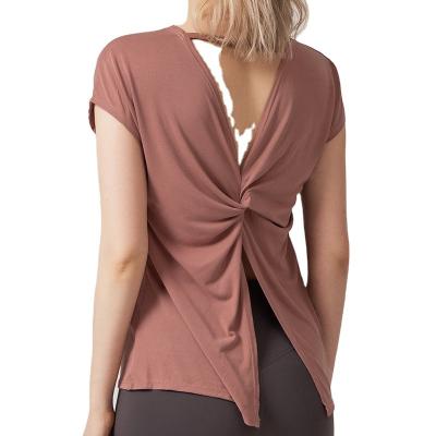 China New European and American ladies slit beauty back solid color breathable yoga clothes loose running sports quick-drying short sleeve top for sale