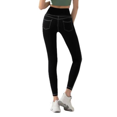 China New European and American ladies breathable hip lift fitness pants comfortable breathable imitation jeans running tight sports pants yoga for sale