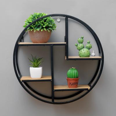 China Nordic Living Room Art Storage Metal Living Room Decor Factory Supply Wooden Shelf Round Wall Mounted for sale