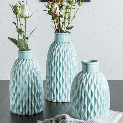 China Simply new arrival nordic style porcelain water wave white ceramic flower vase for sale