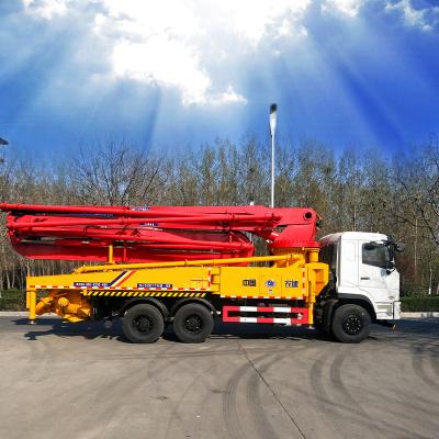 China Construction Material Shops Dongfeng Chassis 5 NationalV IV Emission Standards Boom Section 25 Tons 42m 160-220mm Recession Concrete Mixing Truck With Pump for sale