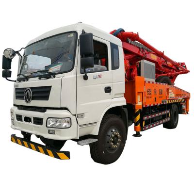 China Building Material Shops Concrete Pump Truck With 30m 33m 38m 42m Length Remote Control Articulating Robotic Arm for sale