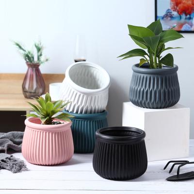 China Mini Modern Simple Flower Pot Planter Ceramic Colorful Flower Pots And Planters For Home Decor for sale