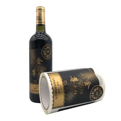 China Custom Waterproof Waterproof Gold Foil Self Adhesive Gloss Alcohol Wine Sticker Luxury Embossed Adhesive Label for sale