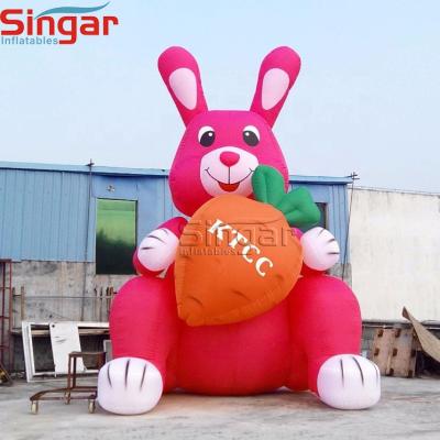 China Inflatable Oxford Easter Bunny With Carrot For Outdoor And Indoor Easter Decoration for sale