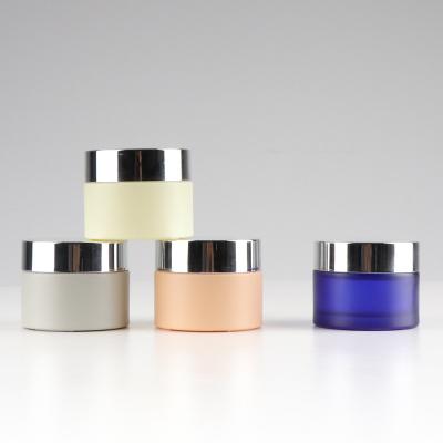 China Personal Care Guangzhou Factory 30g 50g Fine Screw Top Empty Cosmetic Glass Jar For Skin Care for sale