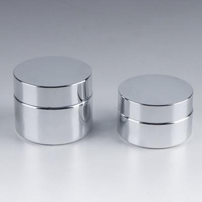 China Personal Care Printing Accept 30g 50g Gold Color Shiny Silver Screw Top Empty Cosmetic Glass Jar for sale